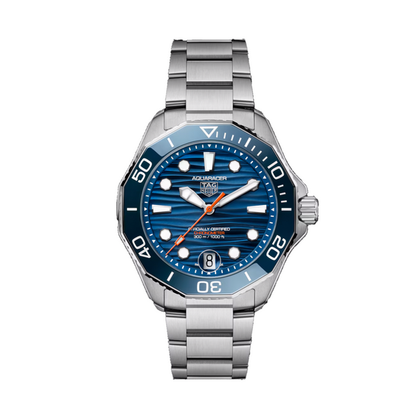 A TAG Heuer Aquaracer watch with a blue ceramic bezel, blue dial with date display, and stainless steel bracelet.Gent's TAG Heuer calibre 5 Automatic Watch. The 42mm case  model WBP5111.BA0013