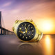 Seiko Coutura Solar Perpetual Calendar Chronograph Watch.  The case and bracelet are yellow gold plated stainless steel, the dial is black and the glass is sapphire crystal. The hour markers are diamond set.