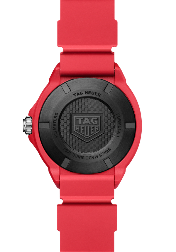 Red watch with black dial featuring Tag Heuer logo on a white background