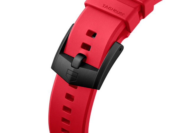 Red watch strap with black clasp on a white background