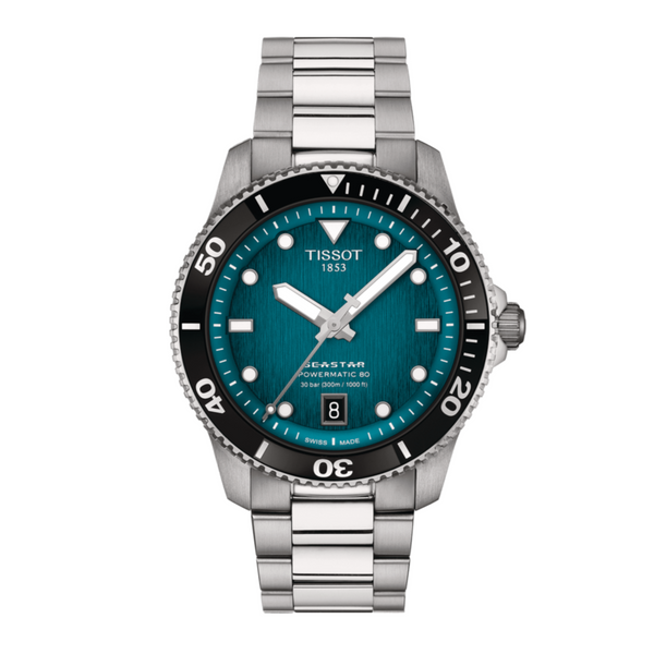 A Tissot T-Sport Seastar 1000 watch with a turquoise dial, stainless steel case and bracelet, and a black mineral bezel ring.