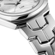 Ladies TAG Heuer Link 32mm Quartz Watch. The case and bracelet are stainless steel, the dial white mother-of-pearl and the glass is sapphire crystal. The watch features diamond set hour markers and a date function.  