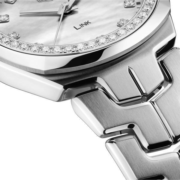 Ladies TAG Heuer Link Quartz Watch. The 32mm case and bracelet are stainless steel, the dial white mother-of-pearl and the glass is sapphire crystal.