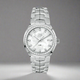 A TAG Heuer ladies quartz watch with a stainless steel case and bracelet, a white mother-of-pearl dial, and a diamond set bezel.