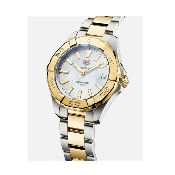 Two-tone watch with gold and silver band on a white background