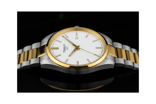 Gent's Tissot PR100 Bicolour: Yellow Gold PVD and Stainless Steel 40mm Case and Bracelet White Dial Sapphire Crystal Glass Date 100m Water Resistant Quartz Watch. 