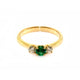 Handfinished 18k Yellow Gold Emerald and Diamond Three Stone Ring.&nbsp;The ring is set with a0.32ct Round Natural Emerald Bright Green in Colour, measuring 4.4mm and 0.60ct Round Brilliant Cut diamonds The emerald and diamonds are set inline into U shaped four claw settings. &nbsp;The shank is slightly raised at the shoulder and has a rounded profile. Based on the stock finger size N, the ring weighs 3.2 grams. FG Colour, VS2-Sl1 Clarity.