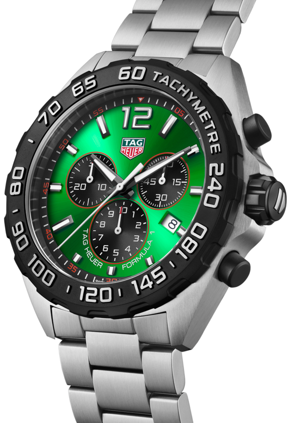 A TAG Heuer Formula 1 chronograph quartz watch with a green dial, black stainless steel case and bracelet, and red accents.