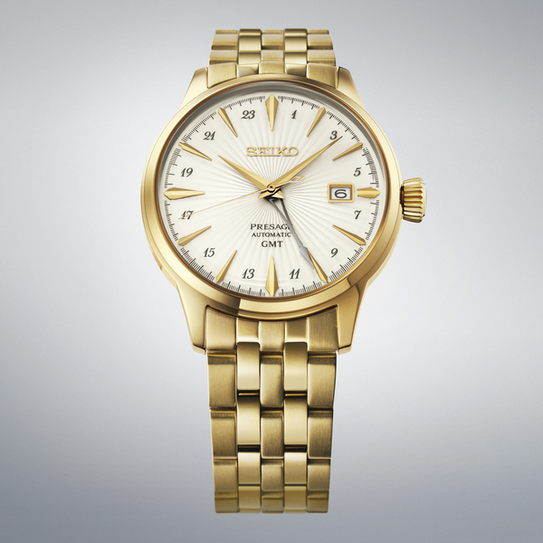 Gent's Seiko Presage Cocktail Time GMT Automatic Watch.&nbsp;

Model number : HCB004J

Availability: in stock

The 40.5mm case is yellow gold PVD on stainless steel. The radial-patterned dial is white with gold coloured hands and indexes. The watch has a GMT hand for setting on a second time zone, 24-hour indicators and a date function. The watch has a see-through case back. The movement is automatic.