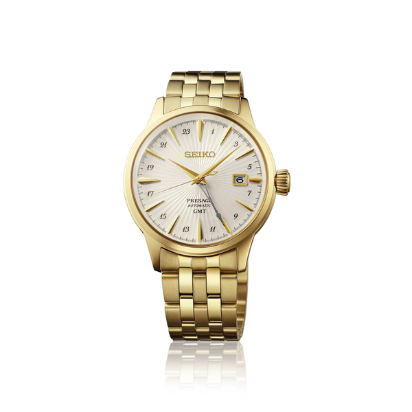 Gent's Seiko Presage Cocktail Time GMT Automatic Watch.&nbsp;

Model number : HCB004J

Availability: in stock

The 40.5mm case is yellow gold PVD on stainless steel. The radial-patterned dial is white with gold coloured hands and indexes. The watch has a GMT hand for setting on a second time zone, 24-hour indicators and a date function. The watch has a see-through case back. The movement is automatic.