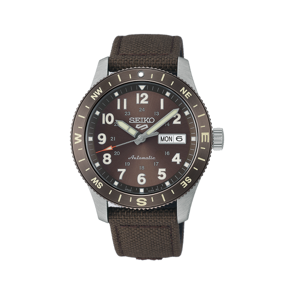 Gent's Seiko 5 Sports Field Series Automatic Watch.

Model Number: HDB009K

Availability: in stock

The 41mm case is stainless steel with a brown nylon strap. The bezel is brown with compass indicators. The dial is brown with a day / date function. The watch has a see-through case back and is 100m water resistant. The movement is automatic.