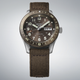 Gent's Seiko 5 Sports Field Series Automatic Watch.

Model Number: HDB009K

Availability: in stock

The 41mm case is stainless steel with a brown nylon strap. The bezel is brown with compass indicators. The dial is brown with a day / date function. The watch has a see-through case back and is 100m water resistant. The movement is automatic.