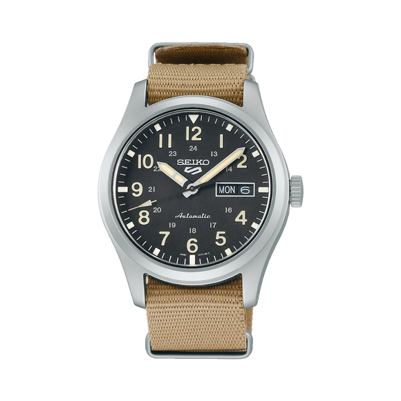 Gent's Seiko 5 Sports Field Series Automatic Watch.
Model Number: SRPG35K
The 39.4mm case is stainless steel with a beige nylon strap. The dial is black with 24-hour markers and a day / date function. The watch has a see-through case back and is 100m water resistant. The movement is automatic.