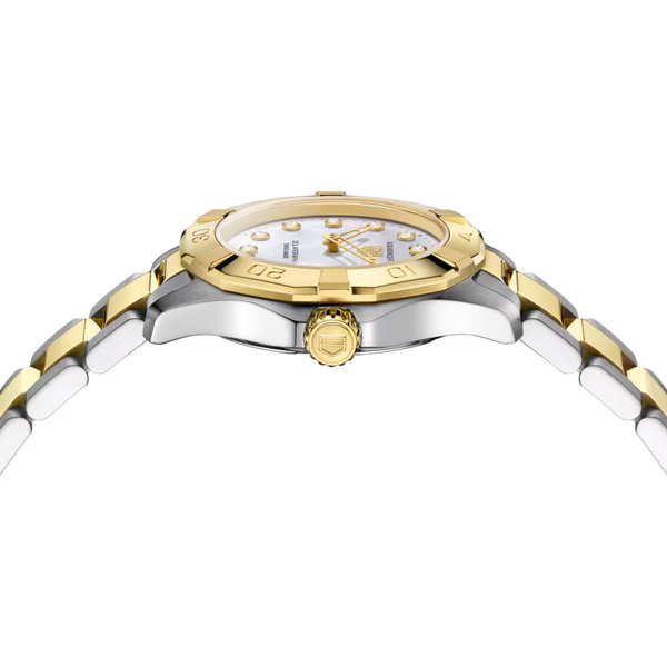 Ladies' TAG Heuer Aquaracer Professional 100 Solargraph Watch. The 28mm case and bracelet are bicolour: stainless steel and 18k yellow gold plated bezel and bracelet links. The dial is white mother-of-pearl with twelve diamond set hour markers (0.07ct, Colour G+, Clarity VS+). The glass is sapphire crystal. The watch is 100 metres water resistant. The movement is a CalibreTH51-00 solar quartz. MODEL WBP1422.BB0006