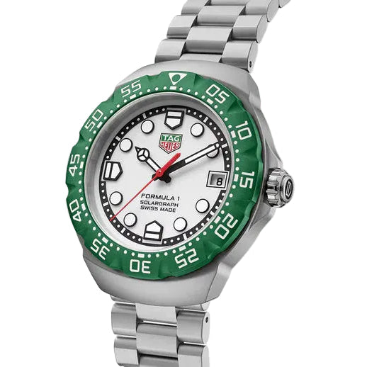 Watch with green bezel and silver bracelet on a white background