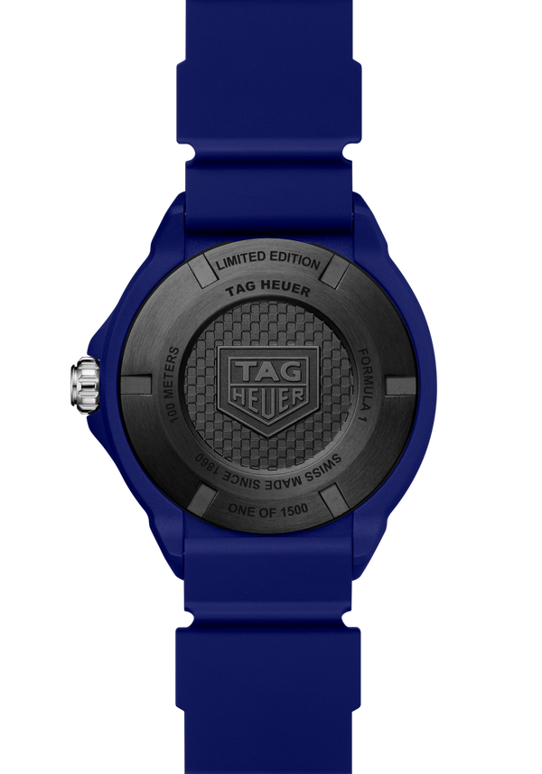 Blue watch with black dial featuring TAG Heuer logo on a white background