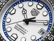 Close-up of a Tag Heuer watch face with blue and black accents.