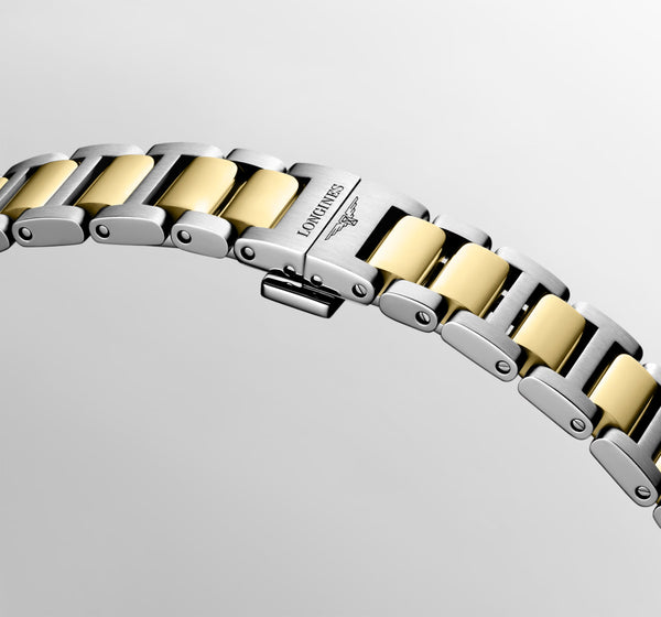 Ladies' Longines Conquest Quartz Watch.
Model Number: L33503127
The 30mm case and bracelet are bicolour: stainless steel with a yellow gold PVD bezel and middle bracelet links. The dial is white with gold coloured hands and indexes. The glass is sapphire crystal. The watch has a date function and is 100m water resistant. The movement is quartz.