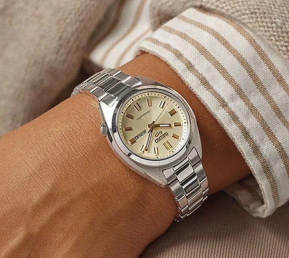 Ladies' Seiko 5 Sports SNXS Series Automatic Watch.
Model number: SRE023K
32mm Stainless Steel Case and Bracelet Champagne Coloured Dial Day/Date Function 100m Water Resistant Automatic Watch.
