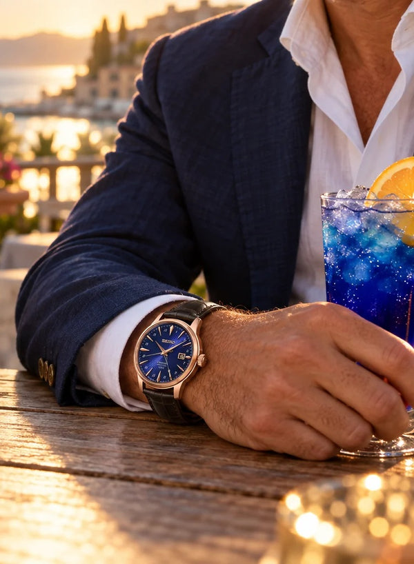 Gent's Seiko Presage Cocktail Time GMT Automatic Watch.

Model: HCB005J

The 40.5mm case is rose gold PVD on stainless steel with a brown leather strap and deployment clasp. The radial patterned dial is blue with rose coloured hands and indexes. The watch has a GMT hand for setting on a second time zone, 24-hour indicators and a date function. The watch has a see-through case back. The movement is automatic.