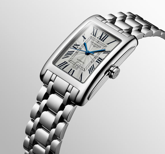 Gent's Longines Dolce Vita Automatic Watch.

Model Number: L57574716

Availability: in stock

The 27.7 x 43.8mm rectangular case and bracelet are stainless steel. The dial is silver with a flinque pattern, black roman numerals, blue hands and a date function. The glass is sapphire crystal. The movement is automatic.