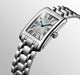 Gent's Longines Dolce Vita Automatic Watch.

Model Number: L57574716

Availability: in stock

The 27.7 x 43.8mm rectangular case and bracelet are stainless steel. The dial is silver with a flinque pattern, black roman numerals, blue hands and a date function. The glass is sapphire crystal. The movement is automatic.