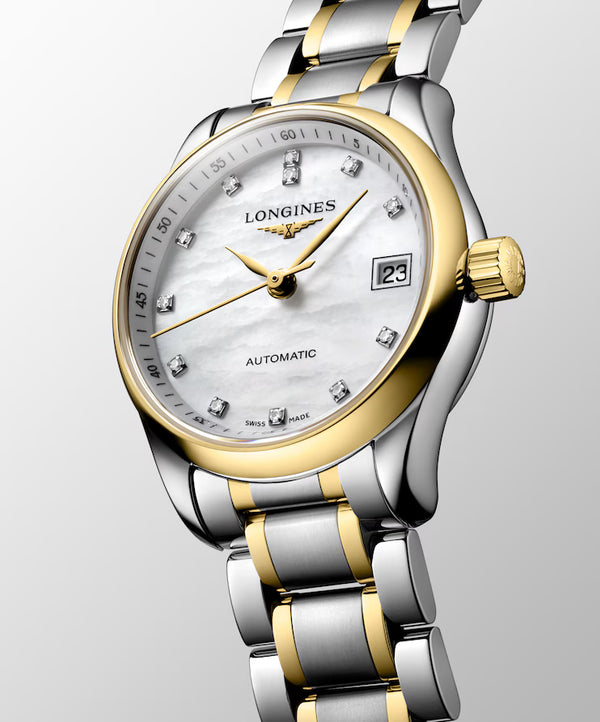 Ladies' Longines Master Collection Automatic Watch. The 25.5mm case and bracelet are bicolour: stainless steel with 18k yellow gold capped bezel and capped centre links. The dial is white mother-of-pearl with twelve diamond set hour markers and a date function. The glass is sapphire crystal and the case back is transparent sapphire crystal &nbsp;glass. The movement is automatic.