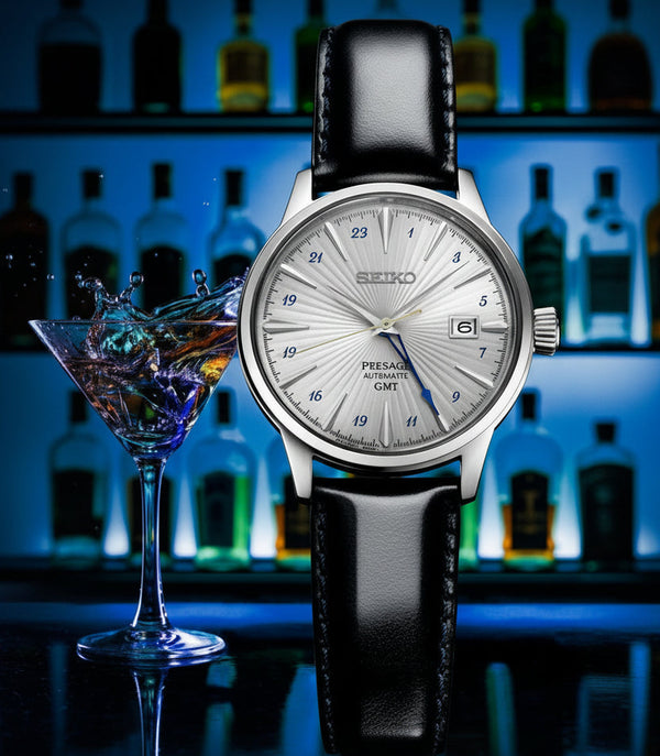 Seiko watch with black leather strap on a blurred background