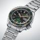 Gent's Seiko 5 Sports SKX Series Automatic Watch.

Model Number: HDB005K

Availability: in stock

The 42.5mm case and bracelet are stainless steel. The bezel is green. The dial is green with rose coloured hands and indexes and a day/date function. The watch has a see-through case back and is 100m water resistant. The movement is automatic.