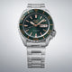 Gent's Seiko 5 Sports SKX Series Automatic Watch.

Model Number: HDB005K

Availability: in stock

The 42.5mm case and bracelet are stainless steel. The bezel is green. The dial is green with rose coloured hands and indexes and a day/date function. The watch has a see-through case back and is 100m water resistant. The movement is automatic.