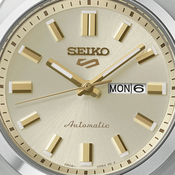 Ladies' Seiko 5 Sports SNXS Series Automatic Watch.
Model number: SRE023K
32mm Stainless Steel Case and Bracelet Champagne Coloured Dial Day/Date Function 100m Water Resistant Automatic Watch.