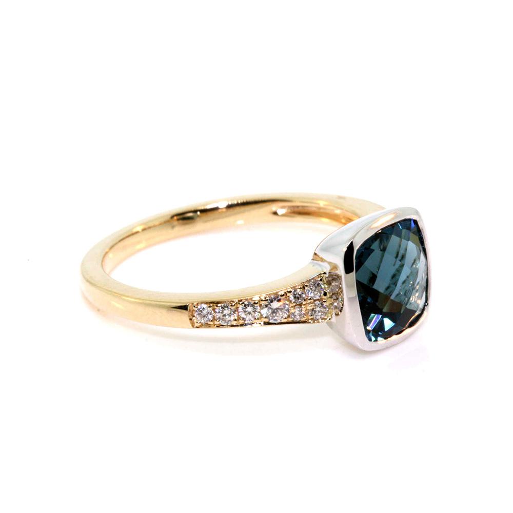 9k yellow and white gold dress ring set with a 1.7ct cushion cut london blue topaz and 0.16cts of round brilliant cut diamonds, quality GH / SI.&nbsp;

This design can be ordered in 9k, 14k and 18k yellow, white or rose gold, and in your preferred choice of amethyst, topaz, citrine, garnet or smokey quartz centre gemstone.